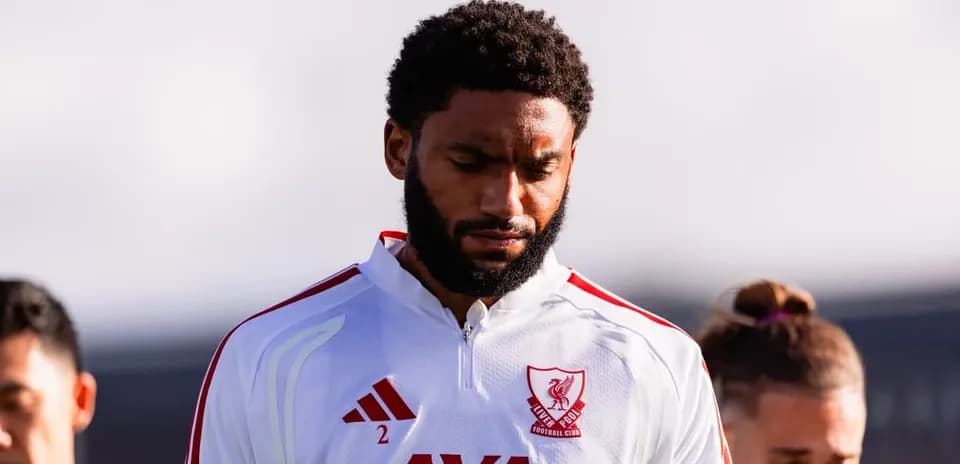 Player in Liverpool kit during team moment