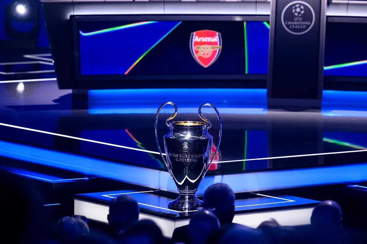 Champions League trophy displayed with Arsenal logo Champions League trophy displayed with Arsenal logo