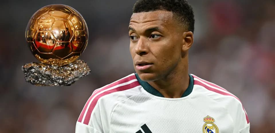 Kylian Mbappé with Ballon d'Or trophy in background