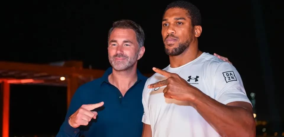 Two men posing together at an event