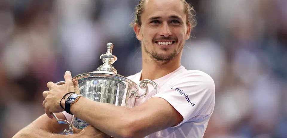 Player celebrating victory with championship trophy