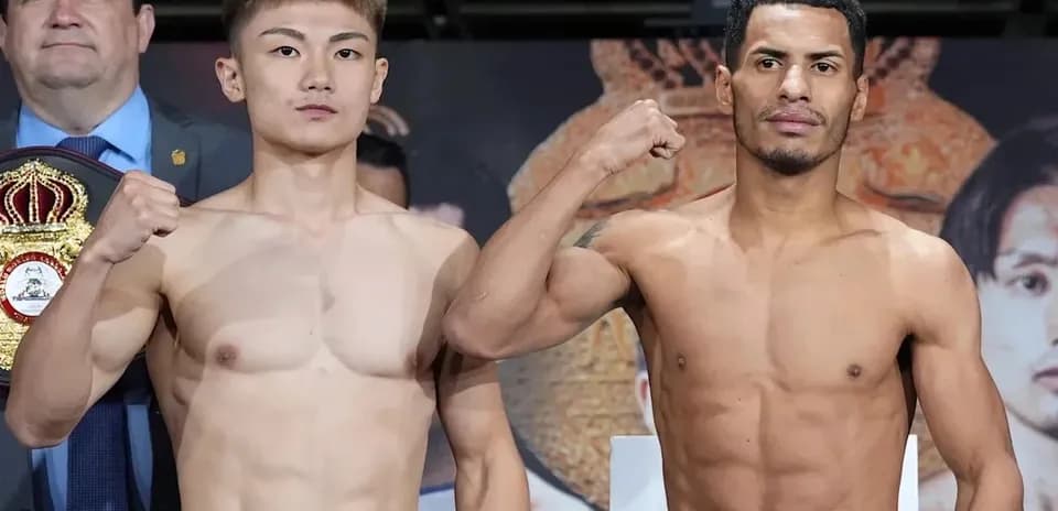 Two boxers posing for weigh-in event