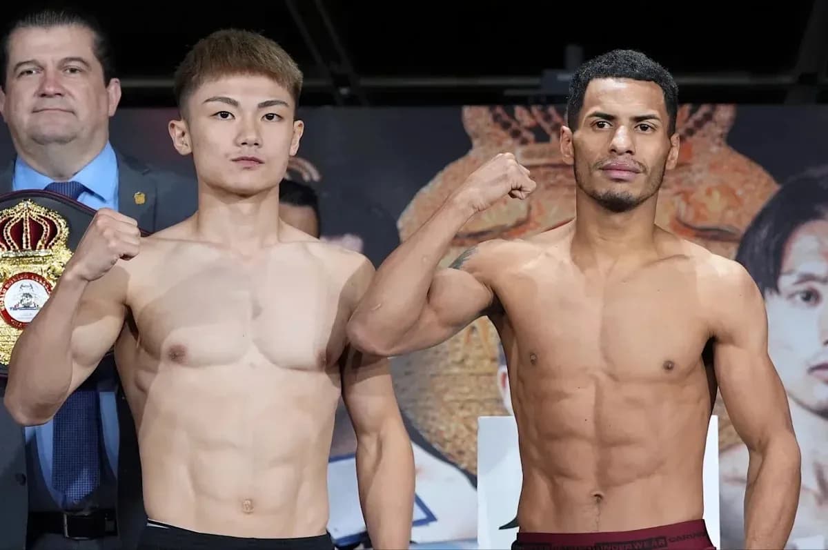 Two boxers posing for weigh-in event