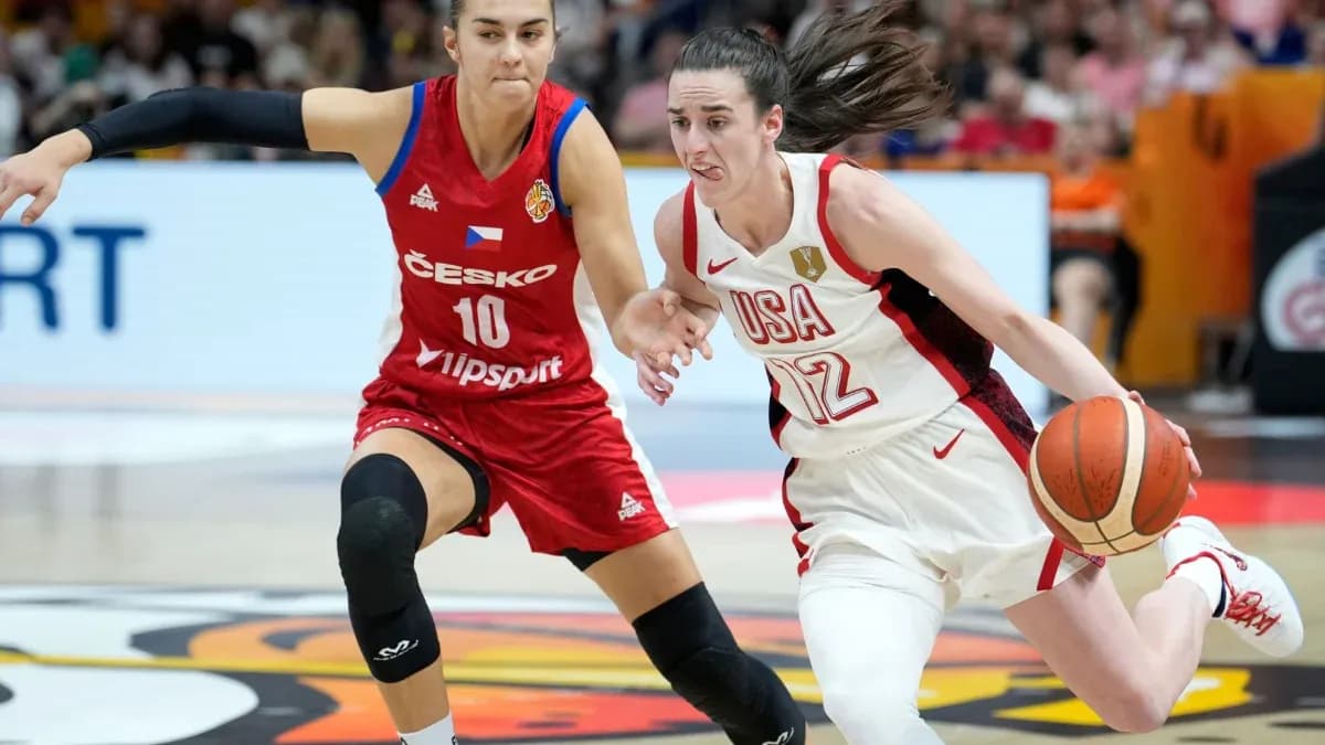 USA player dribbling past Czech player in basketball match