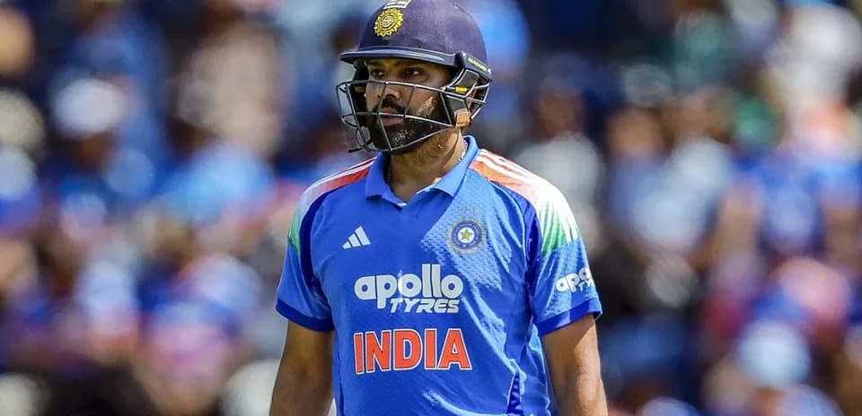 Rohit Sharma walking on the cricket field