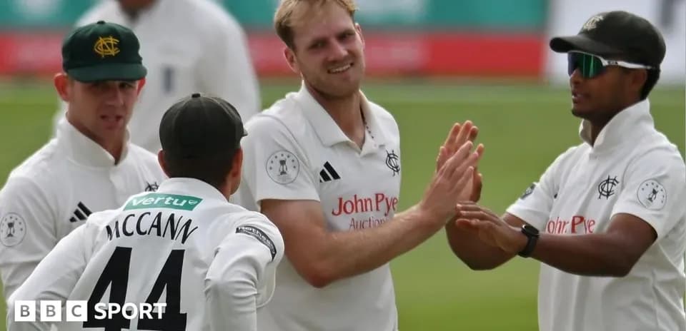 Cricketers celebrating a wicket on the field