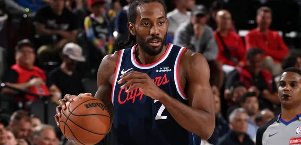Player dribbling basketball during game action