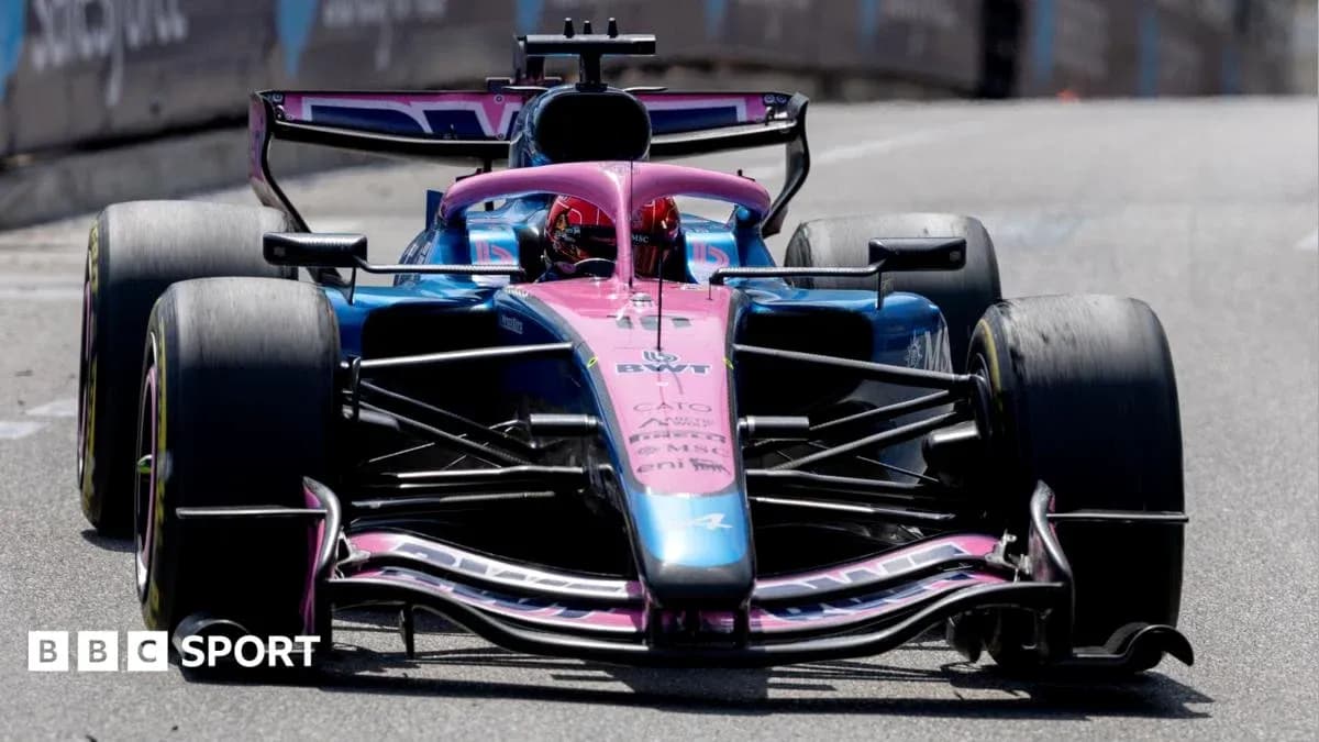 Formula 1 car racing on a street circuit