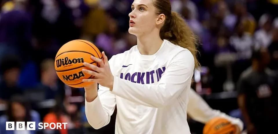 Player warming up with basketball before game