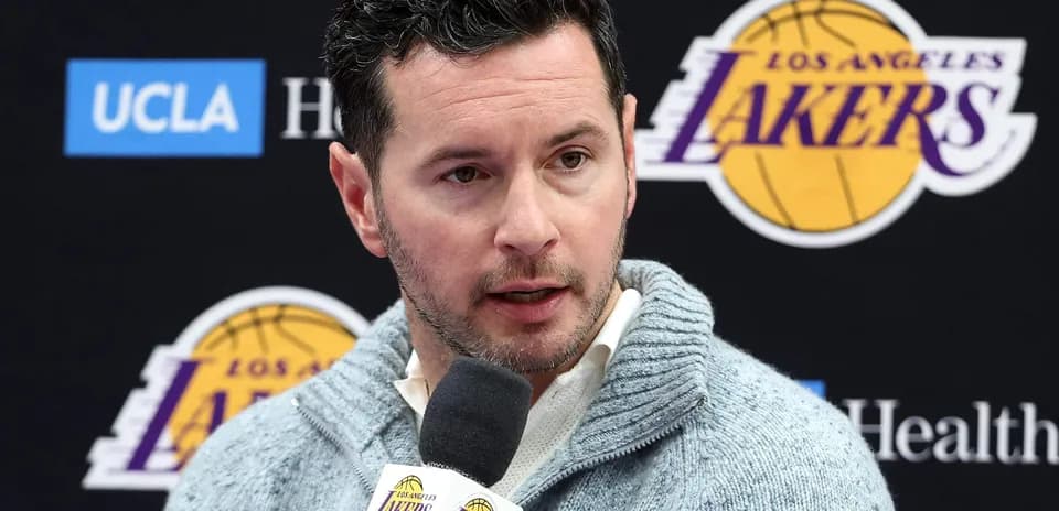 Man speaking at Los Angeles Lakers press conference