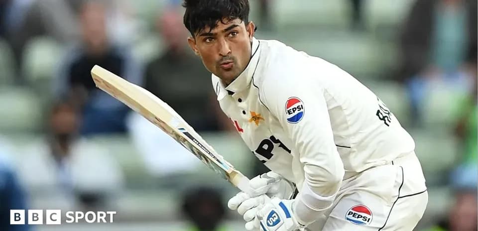 Batsman preparing to strike during cricket match