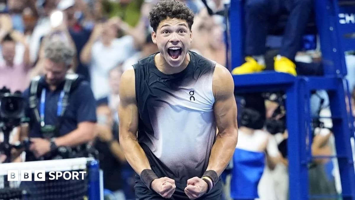 Tennis player celebrating a victory on court