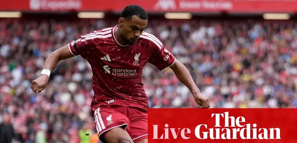 Liverpool player dribbling during a match at Anfield