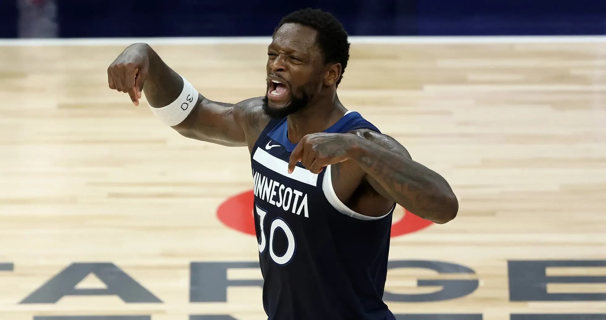 Player celebrating during a basketball game at Target Center