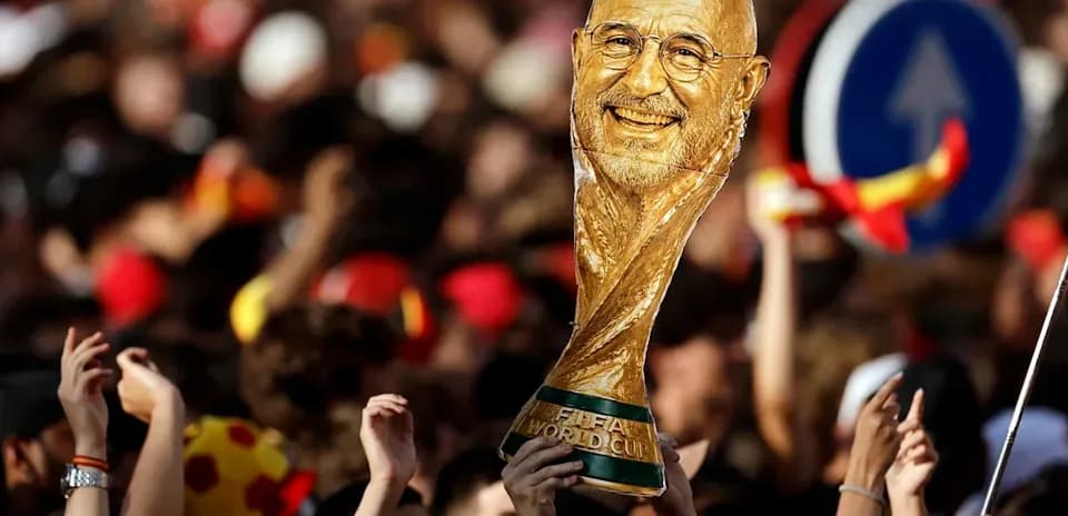 Crowd celebrating with FIFA World Cup trophy
