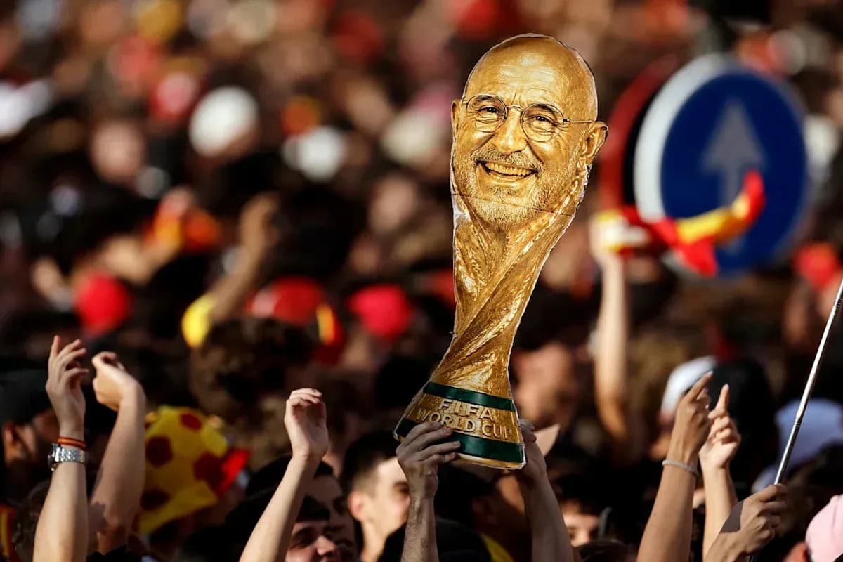 Crowd celebrating with FIFA World Cup trophy