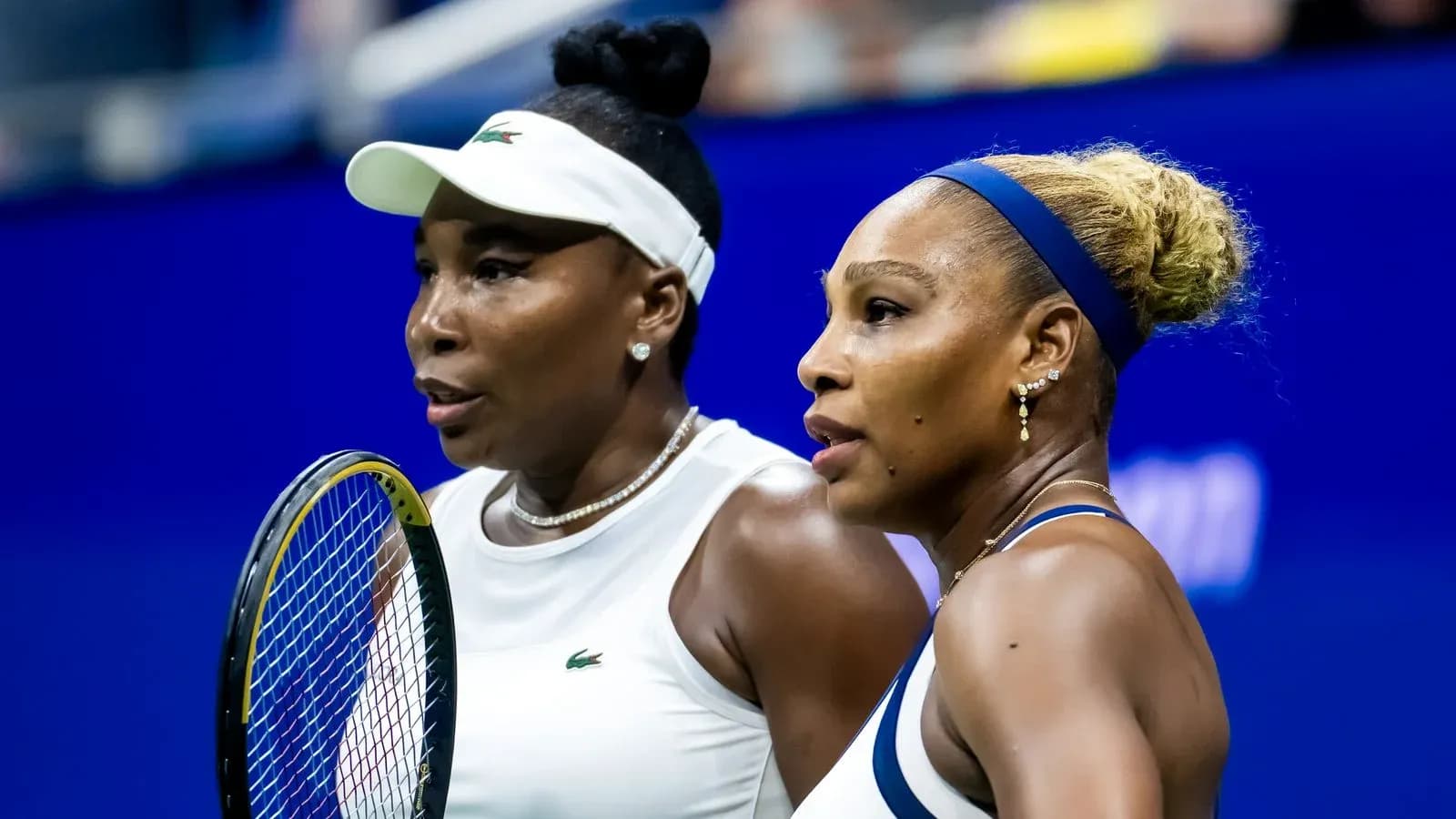 Venus and Serena Williams during tennis match