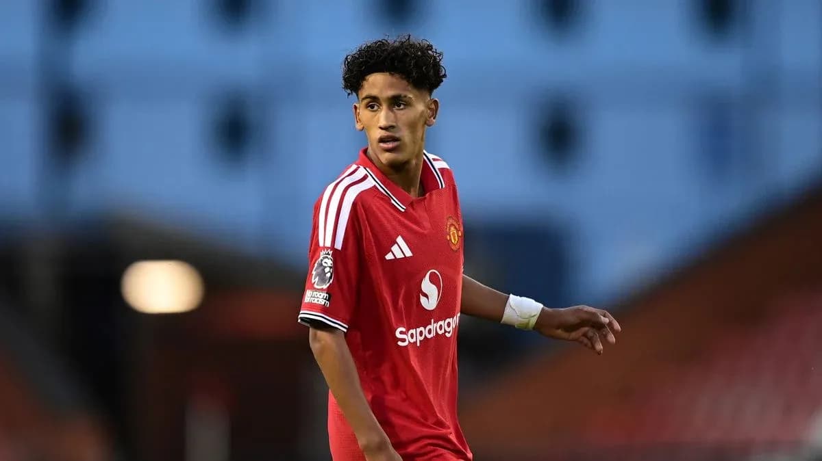Young player in Manchester United kit on field
