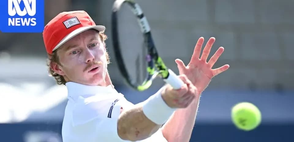 Tennis player hitting a forehand shot on court
