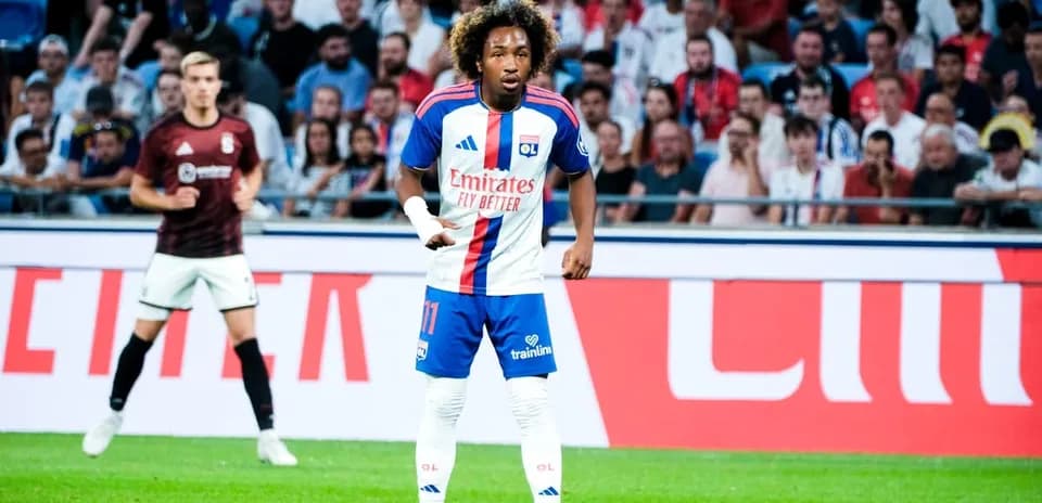 Player in Lyon kit during match action