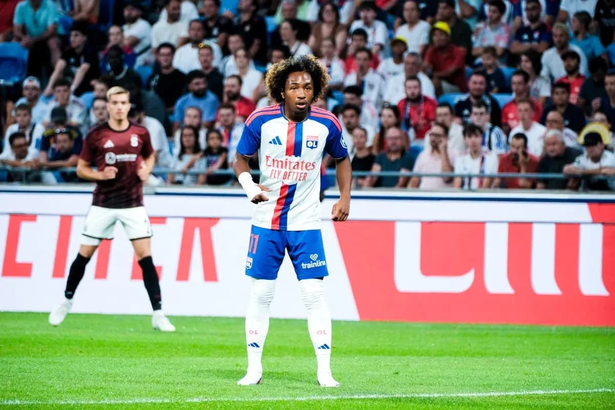 Player in Lyon kit during match action