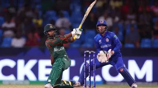 Batsman hitting ball with wicketkeeper in position
