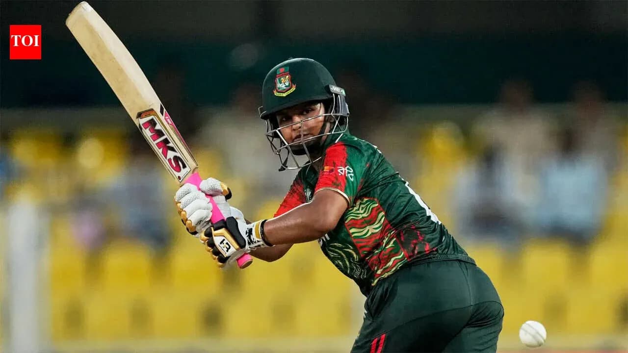 Batsman playing a shot in cricket match