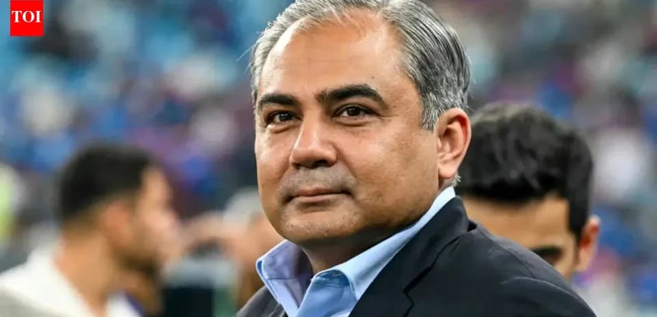 Man in suit at sporting event background
