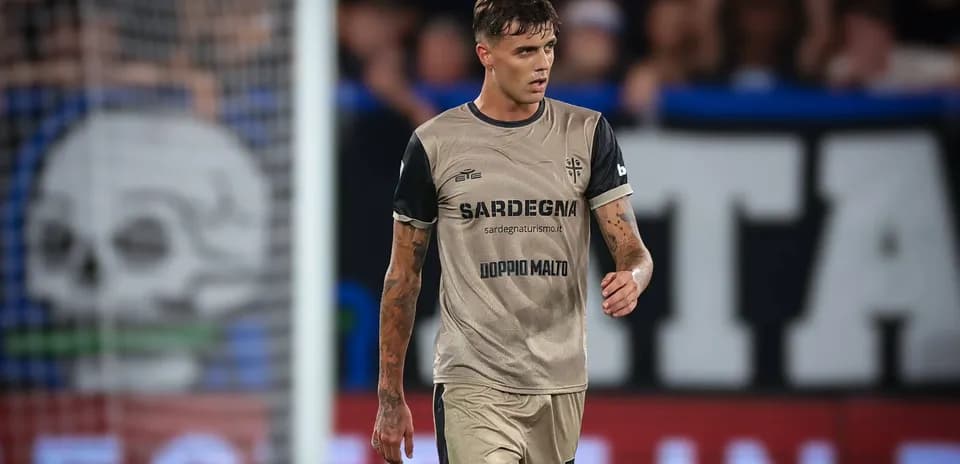 Player in tan jersey walking on the field