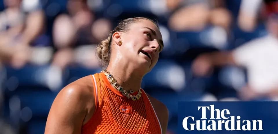 Tennis player reacting during match in bright outfit