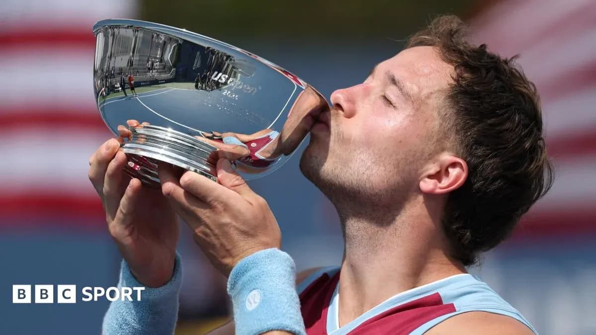Player kissing trophy after winning US Open