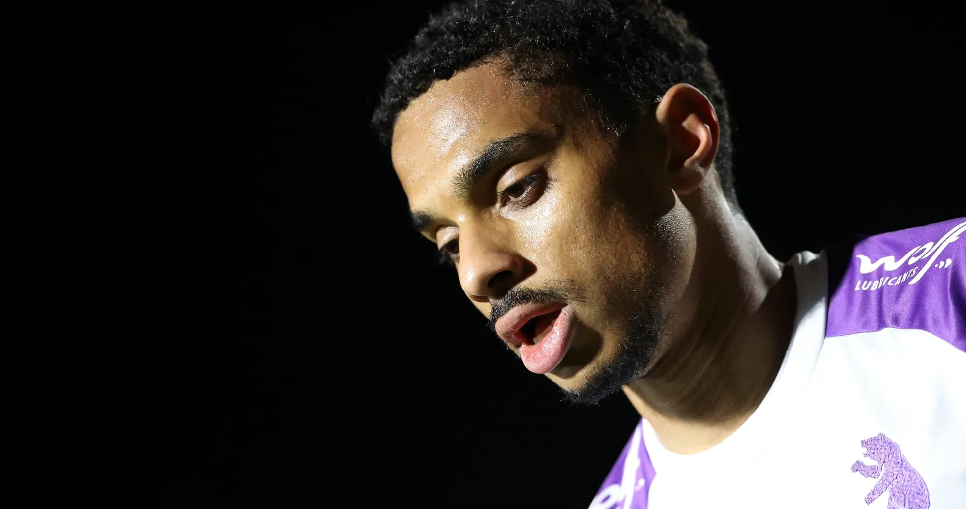 Player looking down during a post-match interview