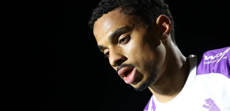 Player looking down during a post-match interview