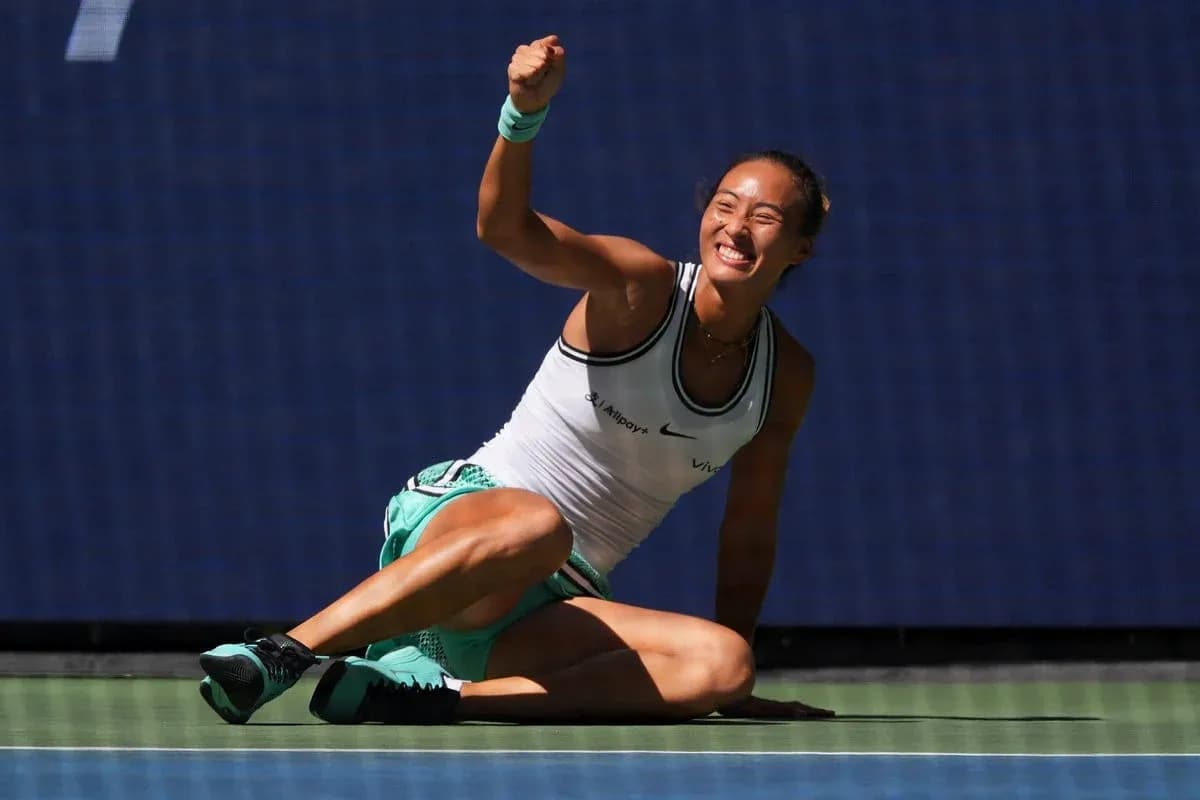 Tennis player celebrating on court after winning point