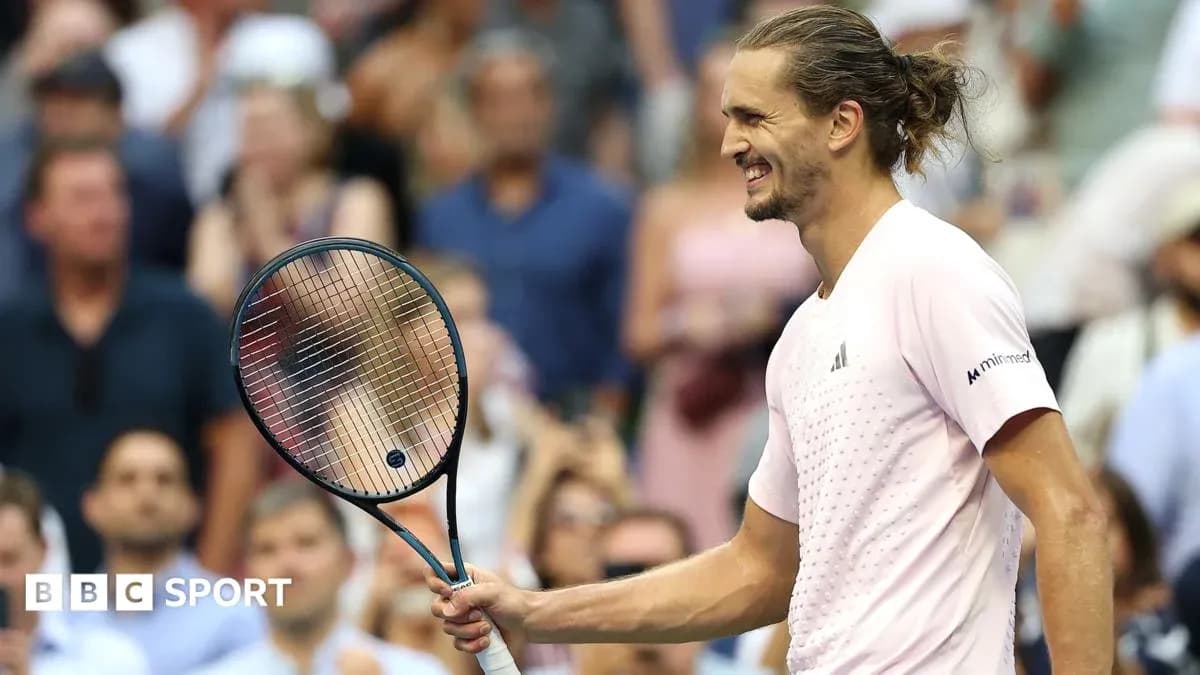 Tennis player celebrating with racket at match