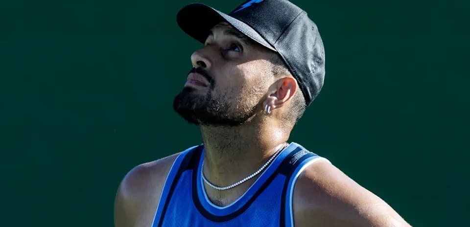 Tennis player looking up during practice session