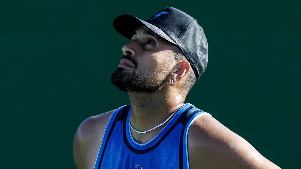 Tennis player looking up during practice session