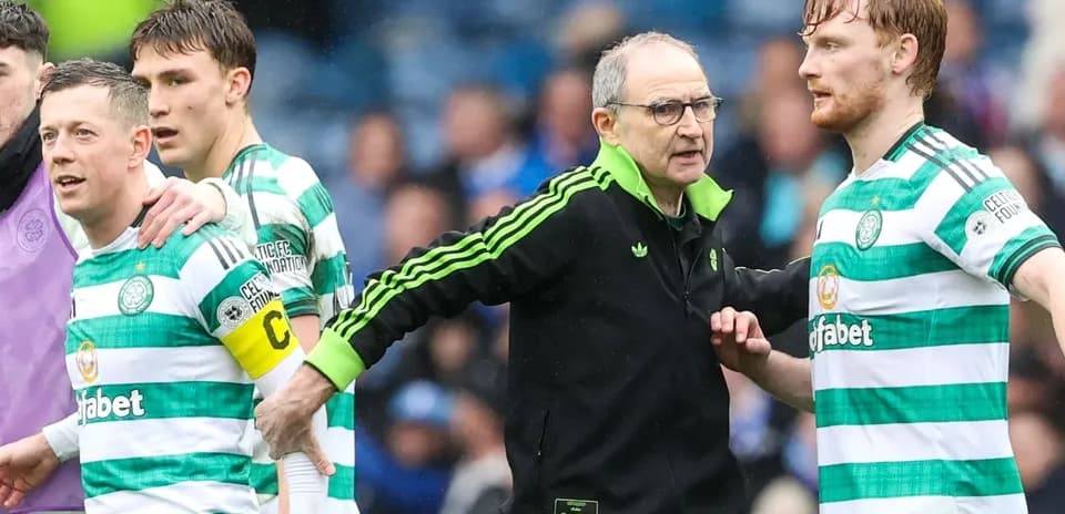 Celtic players and manager during match discussion