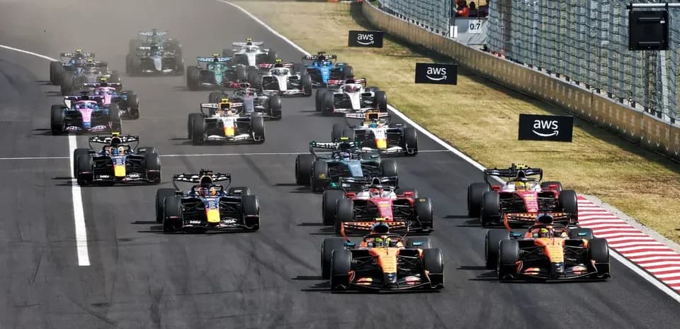 Formula 1 cars racing on track during competition
