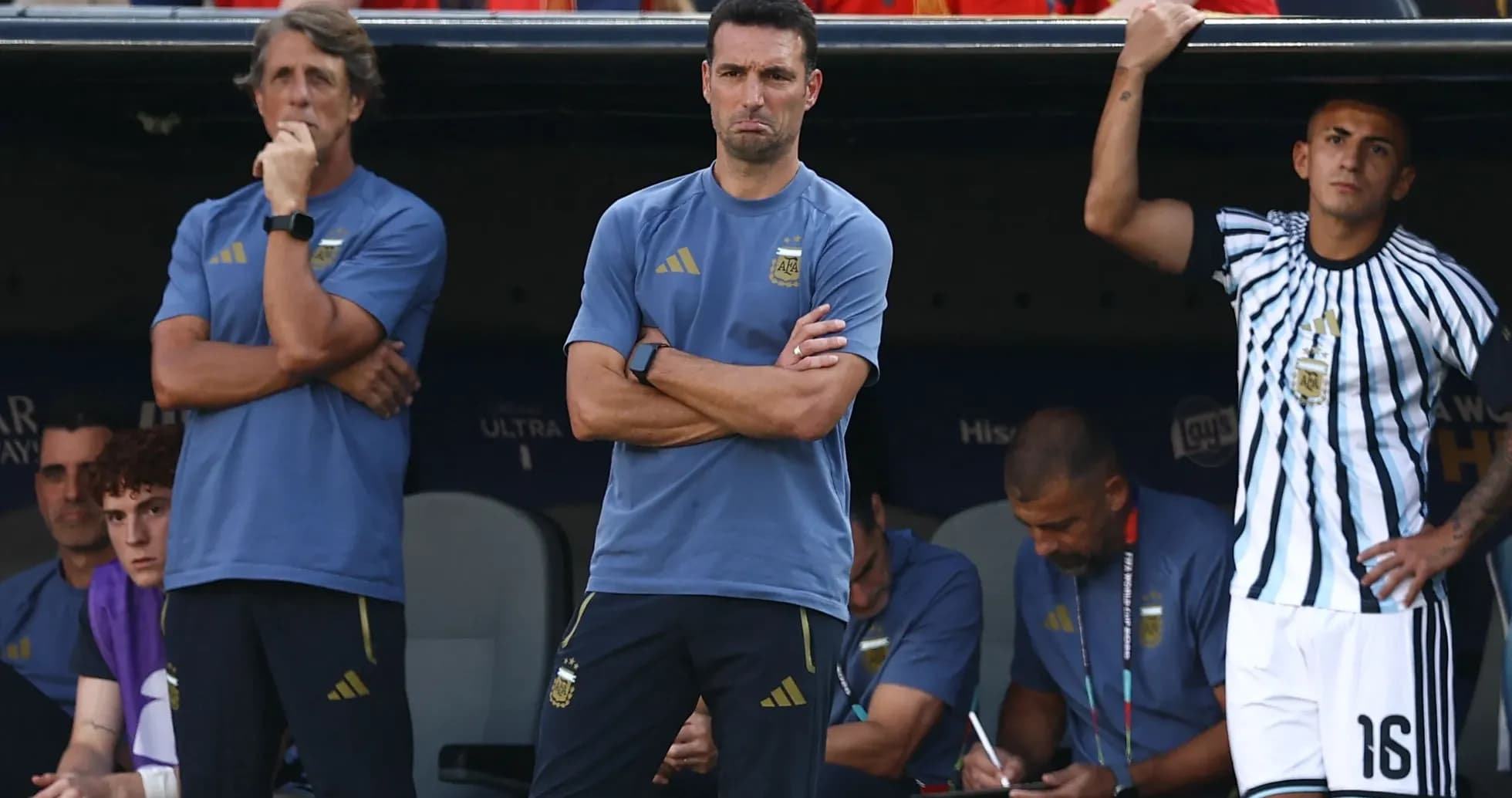 Coaching staff observing match from the bench