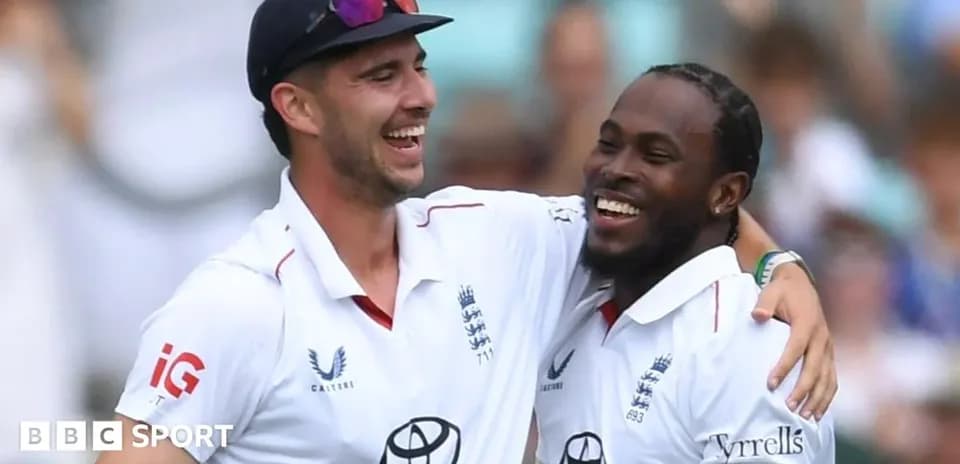 Two cricketers celebrating a wicket together
