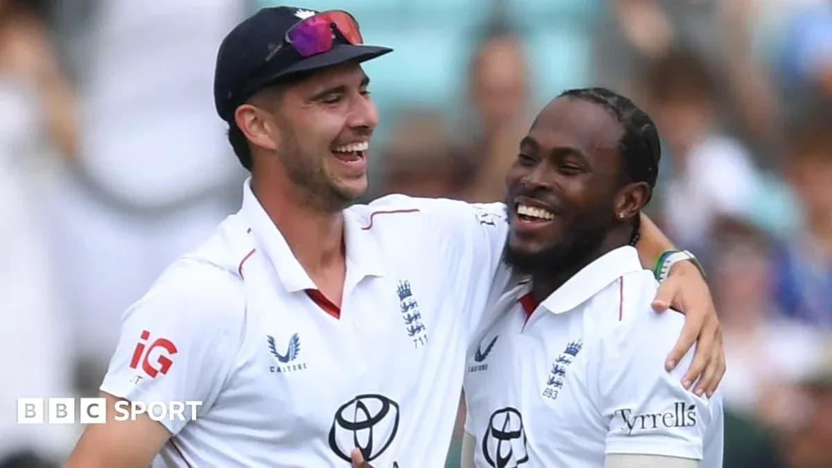 Two cricketers celebrating a wicket together