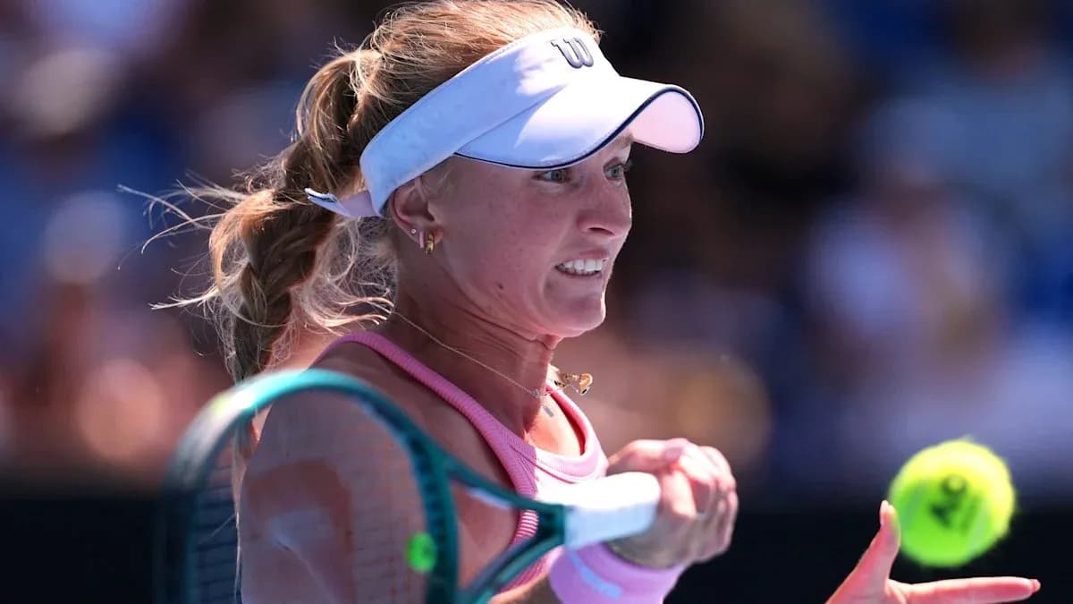 Female tennis player preparing to hit a backhand