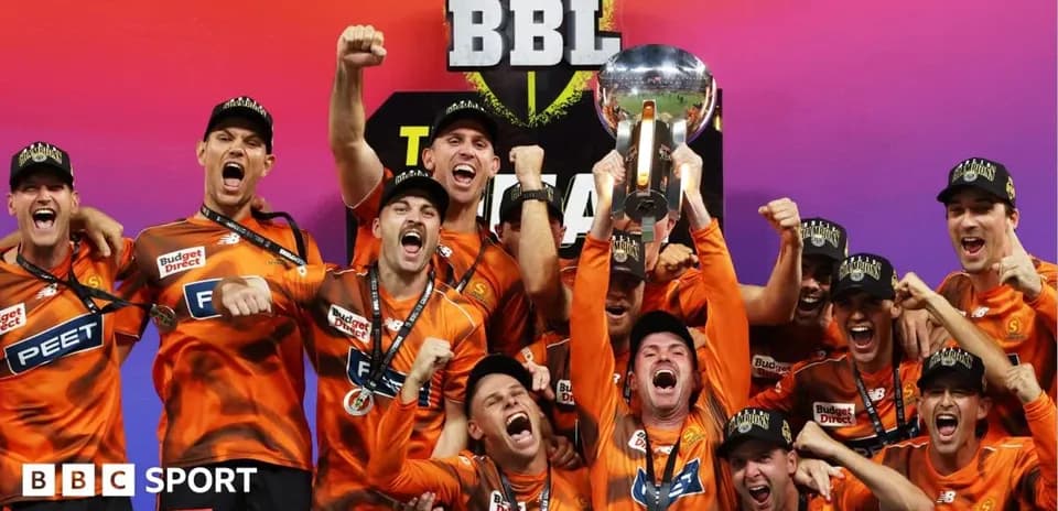 Team celebrating with trophy after BBL championship win