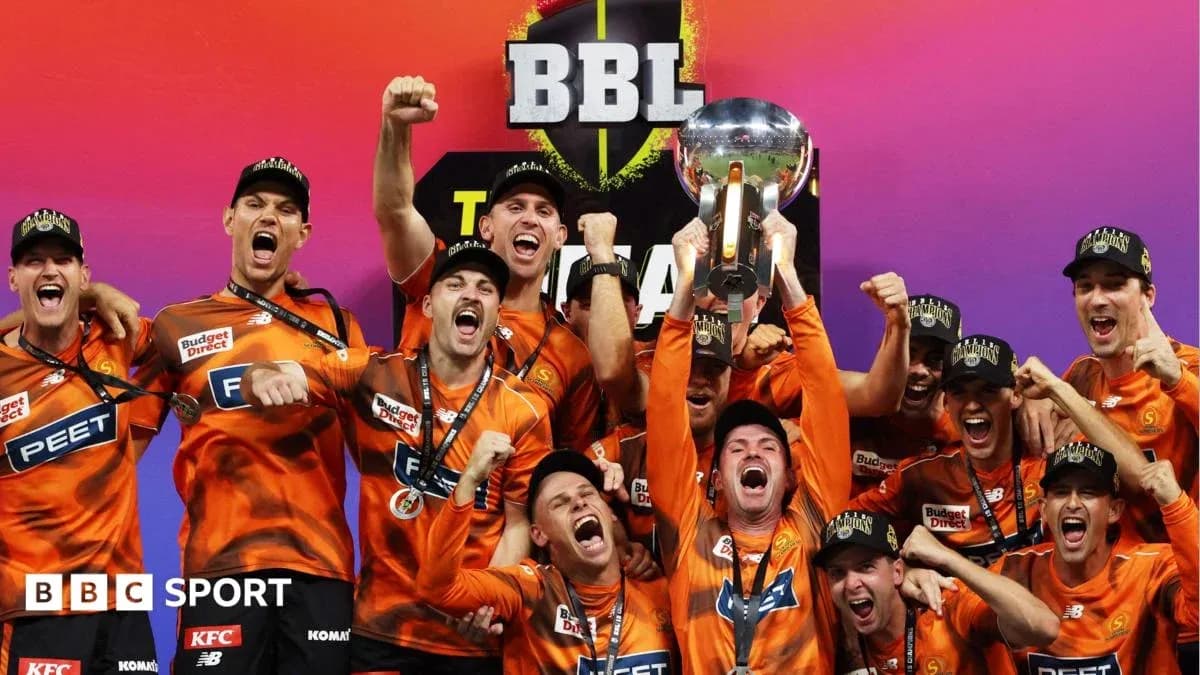 Team celebrating with trophy after BBL championship win