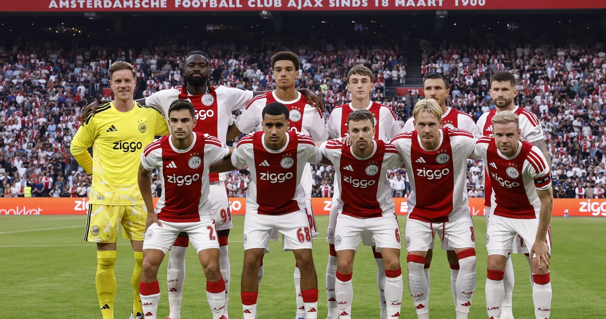 Ajax team posing for photo before a match