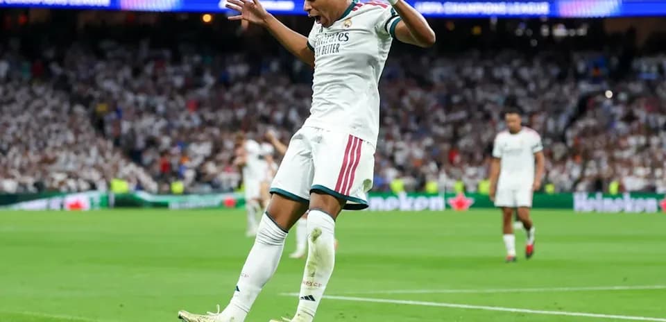 Player celebrating goal during Champions League match