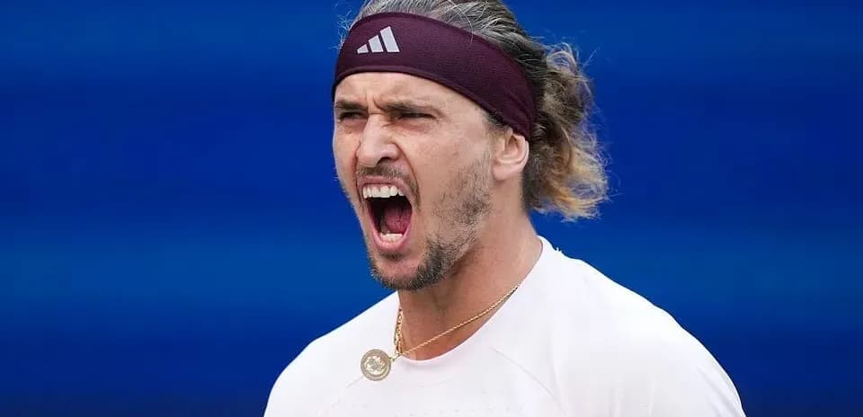 Tennis player celebrating during a match