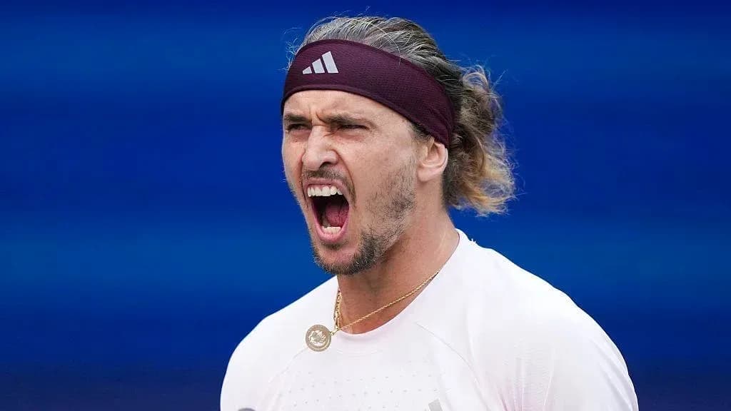 Tennis player celebrating during a match