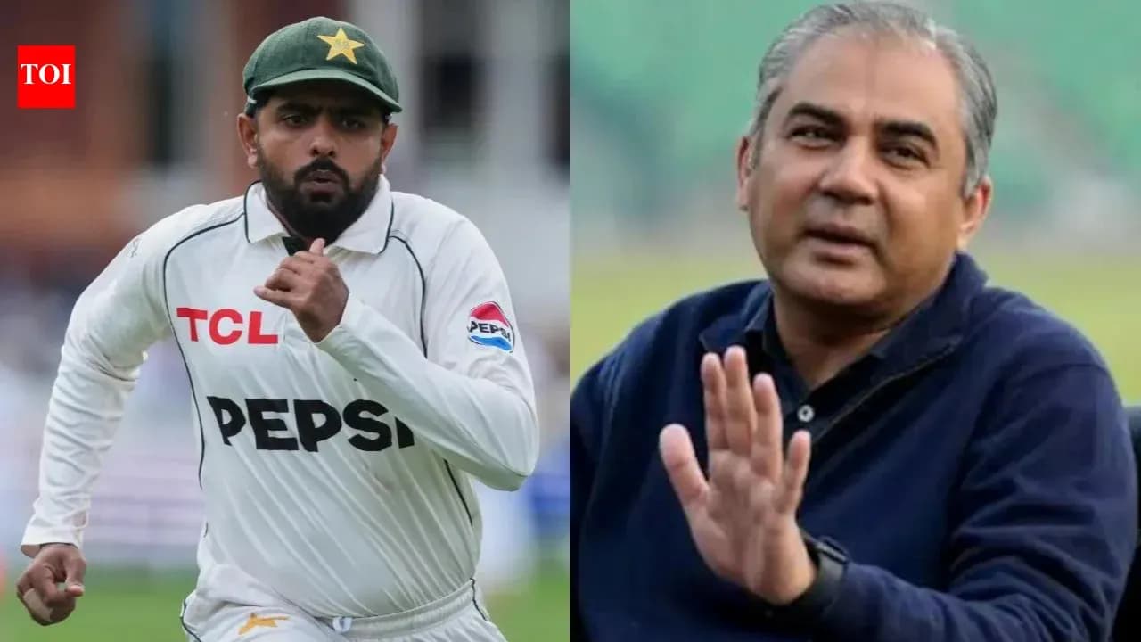 Babar Azam running during a cricket match, coach gesturing